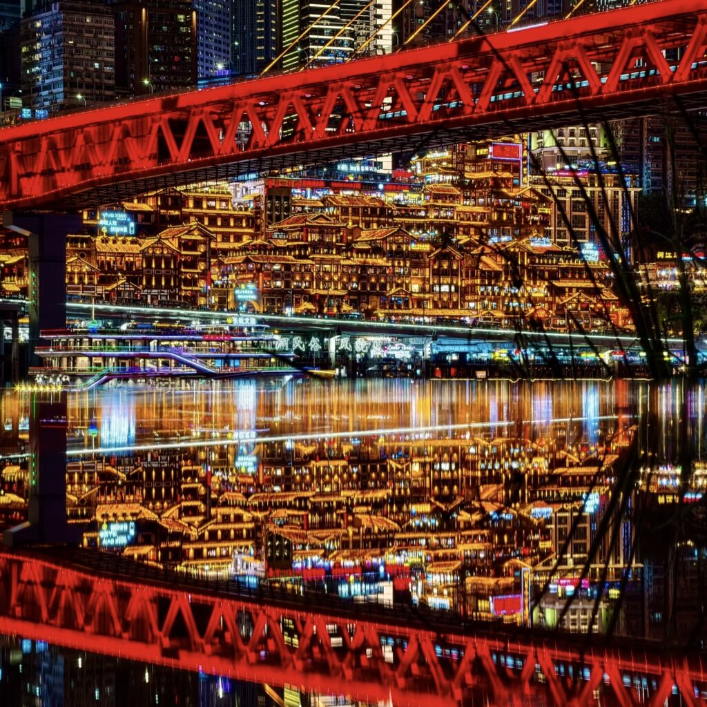 Is Chongqing Worth Visiting1 Night view of Hongya Cave and Qiansimen Bridge, an iconic cyberpunk city scenery in Chongqing.